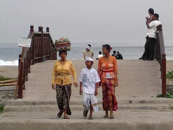 balinese women and kid seminyak beach